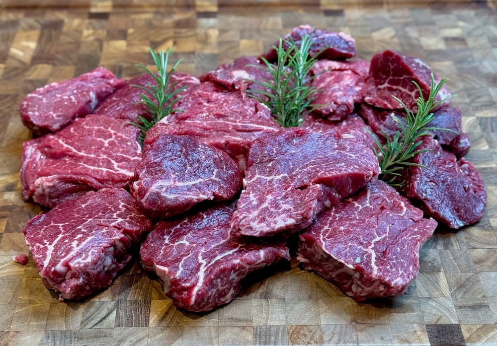 A Galician beef tenderloin cut into filets showing well defined marbling