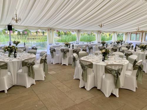 Inside the permanent wedding marquee at Milwards Estate, Laughton, East Sussex.