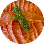 Slices of gravalax topped with a sprig of dill
